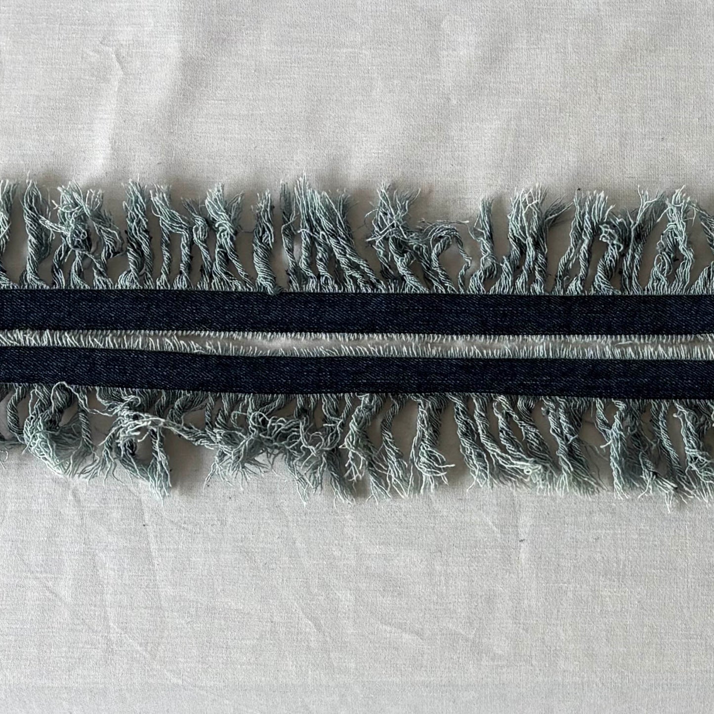 close up of denim fringe