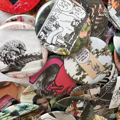 Collection of various buttons with different designs and colors.