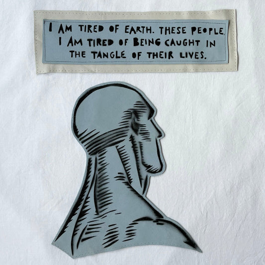 Dr. Manhattan leather and spray paint patch with quote patch "i am tired of earh. these people. i am tired of being caught in the tangle of their lives.