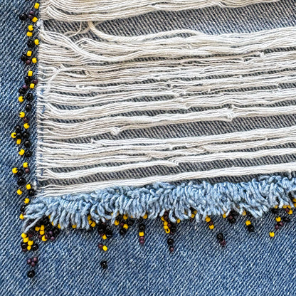 Cropped, Distressed, and Beaded Bugle Boy Jeans