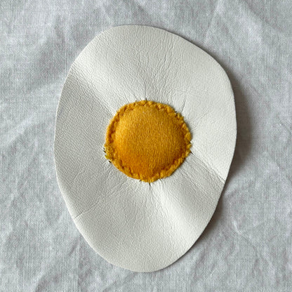 leather fried egg patch wth quilted yellow yoke
